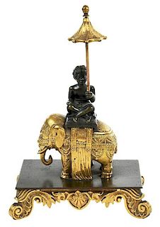 Patinated and Gilt Bronze Figure on Elephant