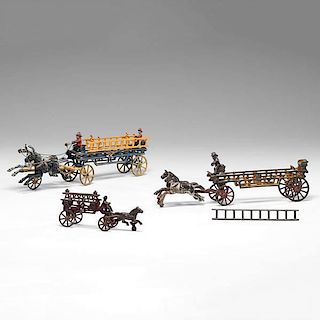 Group of Cast Iron Horse Drawn Fire Wagons 
