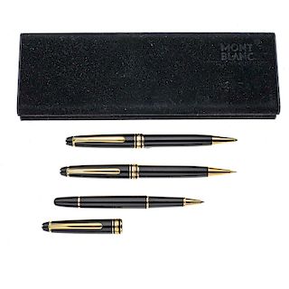 Bolígrafo, rollerball y lapicero MontBlanc. Cuerpo en  resina color negro. Clip en acero dorado. Estuche original.