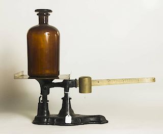 Iron and Brass Scale together with Amber Pharmacy Bottle