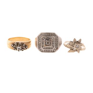A Trio of Diamond Cluster Rings in Gold