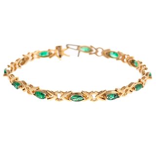 An Emerald "X" Link Bracelet in 14K