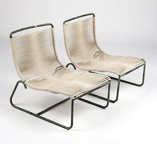 A pair of Walter Lamb bronze lounge chairs