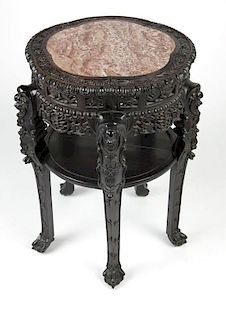 A Chinese export carved hardwood table