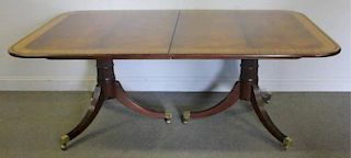 BAKER. Mahogany Banded Dining Table With String