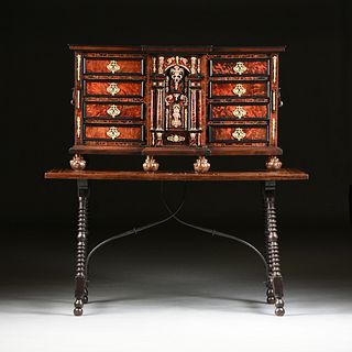 AN IBERIAN EBONIZED INLAID OAK AND FRUITWOOD PAPELEIRA VARGUEÑO ON STAND, 17TH CENTURY,
