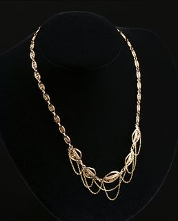 A BELLE ÉPOQUE 18K YELLOW GOLD FILIGREE FESTOONED NECKLACE AND A BRACELET, FRENCH, CIRCA 1900,