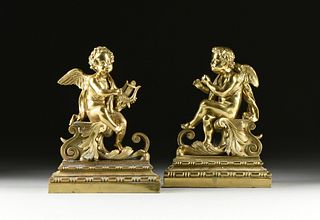 A PAIR OF LOUIS XVI REVIVAL POLISHED BRASS CHERUBEM CHENETS, LATE 19TH/EARLY 20TH CENTURY,