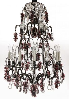 A FINE PATINATED CHANDELIER DRESSED IN ART GLASS FRUIT