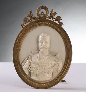 A CARVED IVORY RELIEF BUST PORTRAIT OF TSAR NICHOLAS II