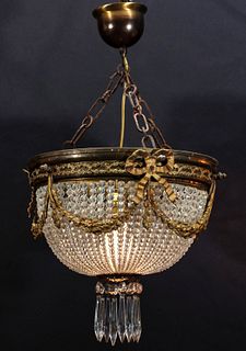 AN EARLY 20TH CENTURY BRASS AND CRYSTAL PLAFONNIER
