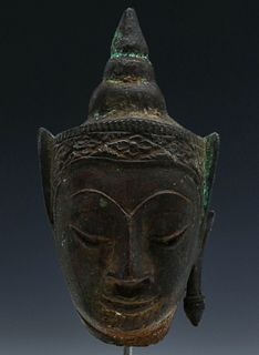 AN 18TH CENTURY ASIAN BRONZE HEAD OF BUDDHA AYUTTHAYA
