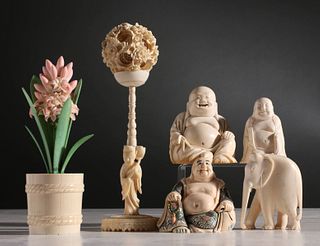 A COLLECTION OF CARVED IVORY OBJECTS