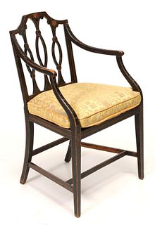 AN EDWARDIAN CANED AND PAINTED BERGERE