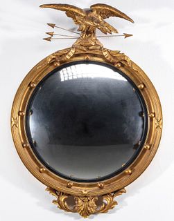 A MID 20TH CENTURY CONVEX MIRROR WITH EAGLE