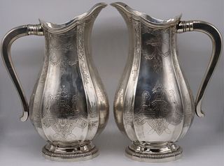 SILVER. (2) Matched .950 Silver Water Jugs.