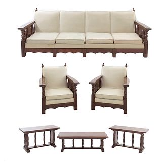 Sala. Siglo XX. En talla de madera. Consta de: a) Sofá de 4 plazas. Con respaldo cerrado y asiento con cojines en tapicería...