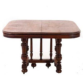 Table. France. 20th Century. Henri II. Carved in oak. Rectangular cover, extendable. 28 x 44 x 41.3" (72 x 112 x 105 cm.)