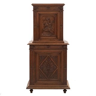 Cabinet. France. 20th Century. Carved in oak. Double wide. 2 collapsible doors. 67.7 x 31.4 x 20.4" (172 x 80 x 52 cm.)