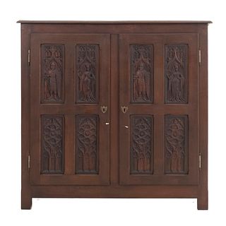 Cabinet. France. 20th Century. Gothic Style. Carved in oak. 2 hinged doors and smooth supports. 47.2 x 48.8 x 13.7" (120 x 124 x 35 cm.)