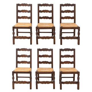 Lot of 6 chairs. France. 20th Century. Oak. Semi-open backrests and woven palm seats.