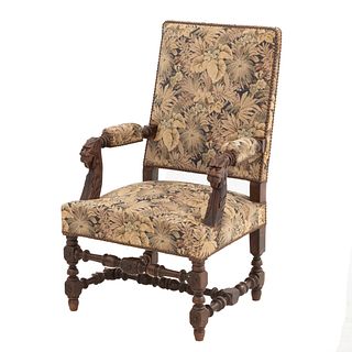 Armchair. France. 20th Century. Oak. Closed backrest and vegetable motif upholstery.