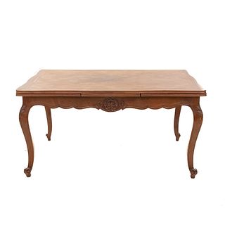 Table. France. 20th Century. Louis XV. Carved in walnut. Extendable system. 29.5 x 58 x 38" (75 x 148 x 97 cm).