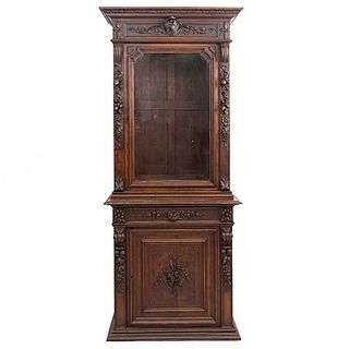 Cabinet. France. 20th Century. Henri II. Carved in oak. Drawer and 2 hinged doors. 92 x 37.7 x 18" (234 x 96 x 46 cm)