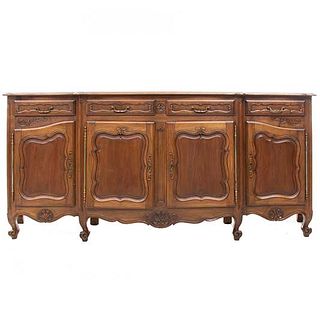 Sideboard. France. 20th Century. Carved in walnut. With 4 drawers and 4 doors. 42 x 97.6 x 21.6" (107 x 248 x 55 cm)