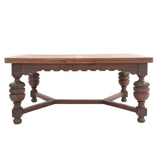Table. France. 20th Century. Carved in walnut. Rectangular cover, extendable system and extensions. 29 x 63 x 47" (74 x 160 x 120 cm)