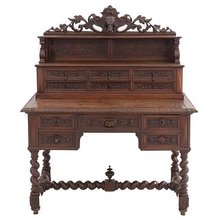 Desk. France. 20th Century. Carved in oak. 10 drawers with metal handles. 55 x 45 x 24" (140 x 115 x 62 cm)