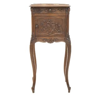 Nightstand. France. 20th Century. Louis XV. Carved in walnut. Marble tabletop. 44.8 x 16.5 x 15" (114 x 42 x 38 cm)