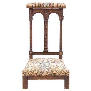 Prie-Dieu. France. 20th Century. Carved in oak. Upholstered in gobelin fabric, ribbed supports.