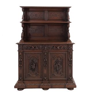 Buffet or Sideboard. France. 20th Century. Carved in oak. Upper shelf, 2 drawers with handle and 2 hinged doors. 74 x 52 x 21.6" (188 x 132 x 55 cm)