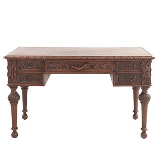 Desk. France. 20th Century. Henri II. Carved in oak. Rectangular desktop with 4 drawers. 29.5 x 51 x 25" (75 x 130 x 64 cm)