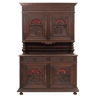 Buffet or Sideboard. France. 20th Century. Bereton Style. Carved in oak. 2 drawers with handles and 4 doors. 90.9 x 59 x 19.6" (231 x 150 x 50 cm)