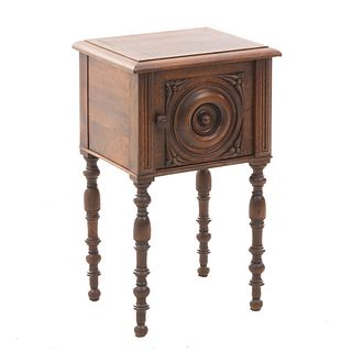 Bedside Table. France. 20th Century.Carved in oak. Rectangular tabletop and hinged door with handle. 26.7 x 15.7 x 14" (68 x 40 x 36 cm)