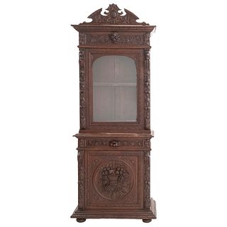 Show Case. France. 20th Century. Henri II. Carved in oak. With drawer and 2 doors. 94.4 x 37 x 17.7" (240 x 94 x 45 cm)