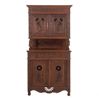 Buffet ro Sideboard. France. 20th Century. Breton Style. Carved in oak. Drawer and 4 hinged doors. 78.7 x 40.5 x 16" (200 x 103 x 41 cm)