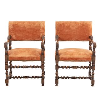 Pair of Armchairs. France. 20th Century. Carved in oak. Semi-open backrests and seats upholstered in orange-colored cloth.