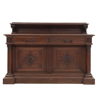 Cabinet. France. 20th Century. Carved in walnut. 2 drawers with metal handles and 2 doors. 49.6 x 70.8 x 25" (126 x 180 x 64 cm)
