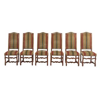 Lot of 6 chairs. France. 20th Century. Carved in oak. Closed backrests and seats upholstered in striped cloth.