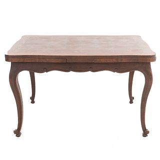 Table. France. 20th Century. Louis XV. Carved in oak. With expandable system. 30.7 x 51 x 39.3" (78 x 130 x 100 cm)