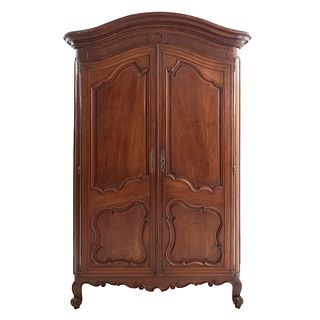 Wardrobe. France. 20th Century. Louis XV. Carved in walnut. With 2 hinged doors and inner shelves. 91.3 x 59 x 24.8" (232 x 150 x 63 cm)