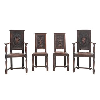 Lot of 2 chairs and 2 armchairs. France. 20th Century. Carved in oak. Closed backrests and faux leather seats.
