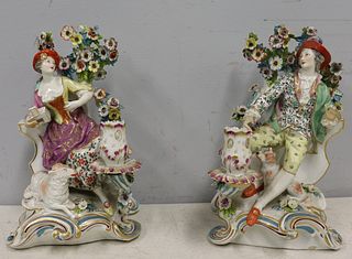 A Pair Chelsea Porcelain Figural Candle Holders.
