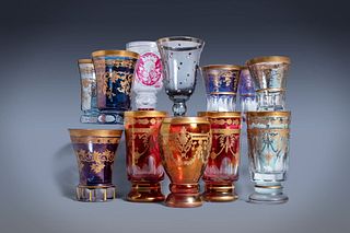 Serie di undici bicchieri in cristallo di Boemia ed un altro in vetro con petit point