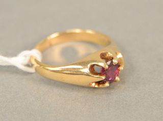 14K gold ring set with ruby. approximately .50 carats.
