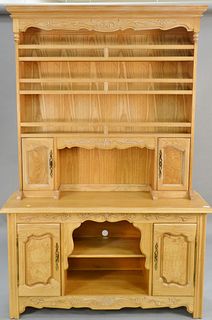 Oak hutch with open top. ht. 84 in., wd. 55 in. Provenance: Estate of William and Teresa Patton, Lake Ave Greenwich, CT