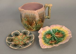 Three Majolica pieces to include large pitcher, leaf plate and small dish all marked Etruscan Majolica. pitcher ht. 5 3/4 in., plate lg. 9 in. Provena